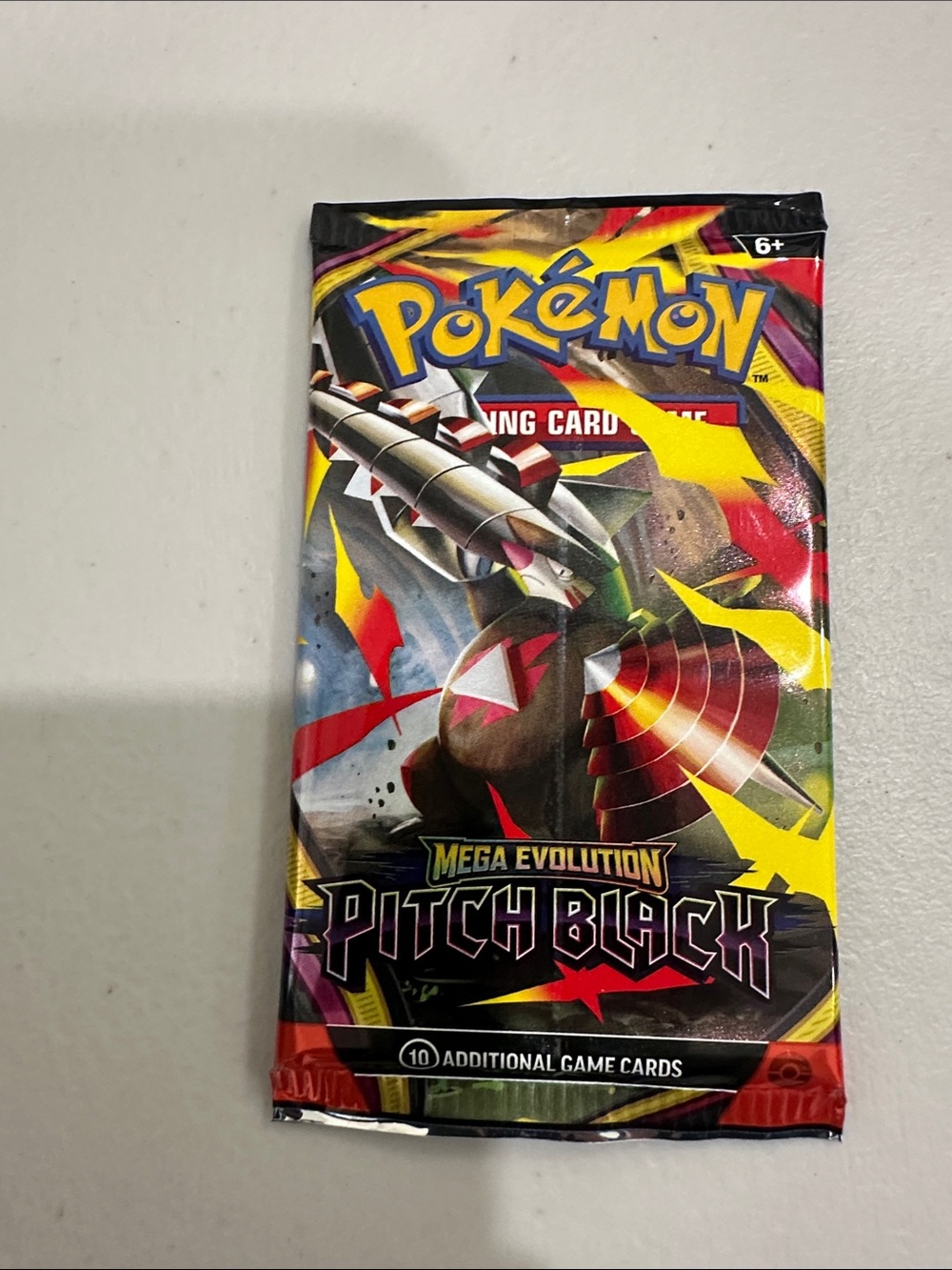 Mega Evolution Pitch Black Booster Pack - Yellow/Red